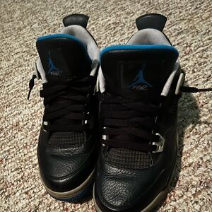 Black and blue Jordan 4